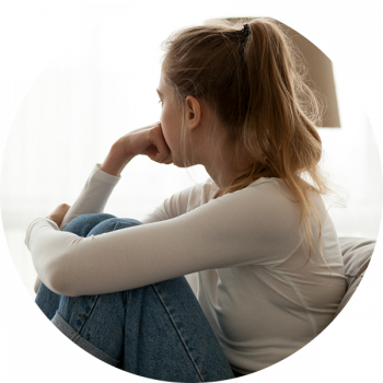 Woman thinking on couch